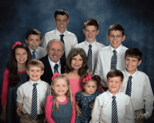 Rev. Doug and Kathy Forbes with their ten grandchildren.  Doug and Kathy’s grandkids often inspire their Ministry Tip articles. 