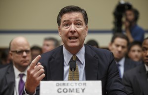 FBI Director James Comey testifies on Capitol Hill in Washington, Thursday, July 7, 2016, before the House Oversight Committee to explain his agency's recommendation to not prosecute Hillary Clinton, now the Democratic presidential candidate, over her private email setup during her time as secretary of state, . (AP Photo/J. Scott Applewhite)