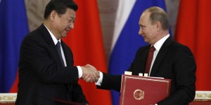 Caption:  Xi Jinping and Vladimir Putin in Shanghai: AP Images  