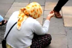 A woman begging on the street