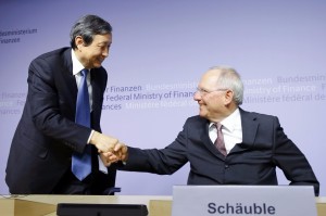German Finance Minister Wolfgang Schäuble, right, and China’s Vice Premier Ma Kai shake hands at a joint news conference in Berlin on Tuesday. Mr. Schäuble said Germany will be a founding member of a new international development bank backed by China, along with other European countries. Photo: Reuters