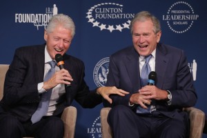 WASHINGTON, DC - SEPTEMBER 08:  Former U.S. presidents Bill Clinton (L) and George W. Bush share a laugh during an event launching the Presidential Leadership Scholars program at the Newseum September 8, 2014 in Washington, DC. With the cooperation of the Clinton, Bush, Lyndon B. Johnson and George H. W. Bush presidential libraries and foundations, the new scholarship program will provide 'motivated leaders across all sectors an opportunity to study presidential leadership and decision making and learn from key administration officials, practitioners and leading academics.'  (Photo by Chip Somodevilla/Getty Images)