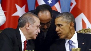 Turkish President Recep Tayyip Erdogan, left, and U.S. President Barack Obama chat during a session of the G-20 Summit in Antalya, Turkey, Nov. 15, 2015.