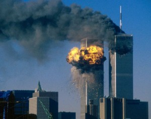 1966-1973, Financial District, New York, New York, USA --- The World Trade Center south tower (L) burst into flames after being struck by hijacked United Airlines Flight 175 as the north tower burns following an earlier attack by a hijacked airliner in New York City September 11, 2001. The stunning aerial assaults on the huge commercial complex where more than 40,000 people worked on an ordinary day were part of a coordinated attack aimed at the nation's financial heart. They destroyed one of America's most dramatic symbols of power and financial strength and left New York reeling.   FOURTH OF SEVEN  PHOTOGRAPHS                                    REUTERS/Sean Adair --- Image by © Sean Adair/Reuters/CORBIS