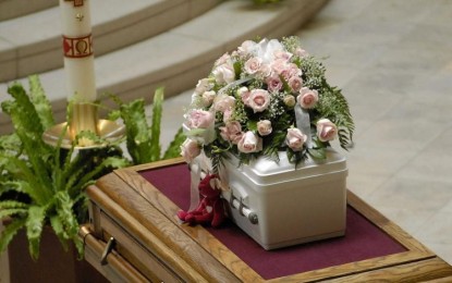 Federal judge puts baby burial rule on hold