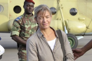 FILE- In this file photo taken Tuesday, April 24, 2012, released Swiss hostage Beatrice Stockly, left, arrives by helicopter from Timbuktu, Mali after being handed over by a militant Islamic group Ansar Dine, in Ouagadougou, Burkina Faso. A Swiss woman who had been briefly abducted back in 2012 was kidnapped again by suspected jihadists who scaled the walls of her home in northern Mali in the middle of the night, authorities said Friday, Jan. 8, 2016,  Witnesses say Beatrice Stockly's door was found open Friday morning in Timbuktu, the town where she returned the year after her first kidnapping. (AP Photo/Brahima Ouedraogo, File)