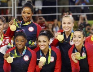 (Photo: Reuters/Mike Blake)Simone Biles, Gabrielle Douglas, Laurie Hernandez, Aly Raisman, and Madison Kochian pose with their gold medals.