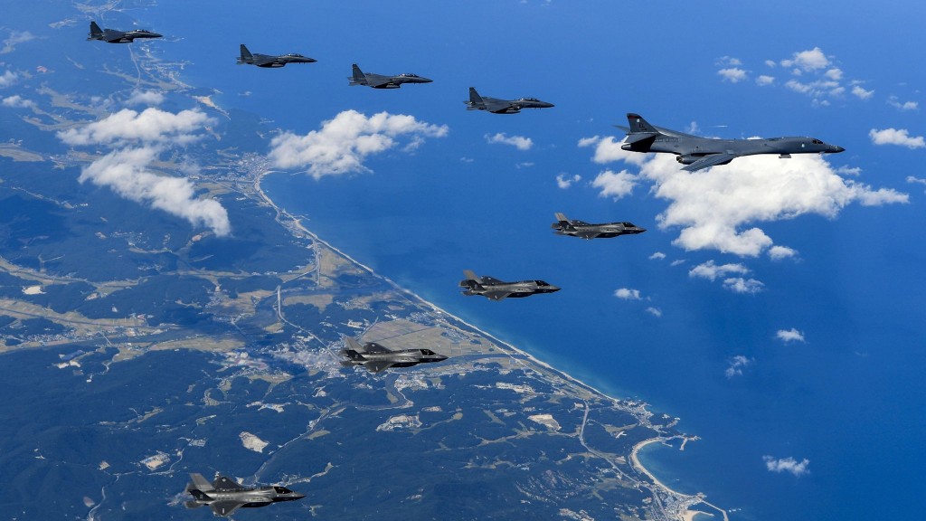This US Army handout photo obtained September 23, 2017 shows Air Force and Marine Corps aircraft conducting a mission with the South Korean air force over the Korean Peninsula, on September 18, 2017.  US bombers accompanied by fighter jets flew off the east coast of North Korea on September 23, 2017 in a show of force designed to project American military power in the face of Pyongyang's weapons programs, the Pentagon said. It was the furthest north of the Demilitarized Zone (DMZ) any US fighter or bomber aircraft have flown off North Korea's coast in this century, Pentagon spokesman Dana White said.  / AFP PHOTO / US ARMY / Steven SCHNEIDER / RESTRICTED TO EDITORIAL USE - MANDATORY CREDIT "AFP PHOTO / US ARMY/STEVEN SCHNEIDER/HANDOUT" - NO MARKETING NO ADVERTISING CAMPAIGNS - DISTRIBUTED AS A SERVICE TO CLIENTS STEVEN SCHNEIDER/AFP/Getty Images