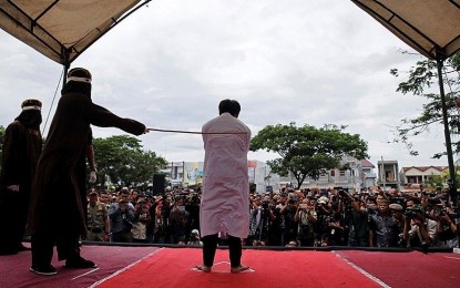 Indonesian Christians flogged outside of mosque for violating sharia law